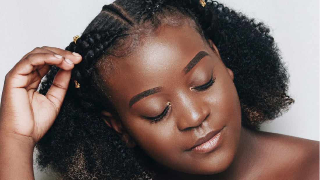 how to pamper yourself blog banner: girl touching black hair